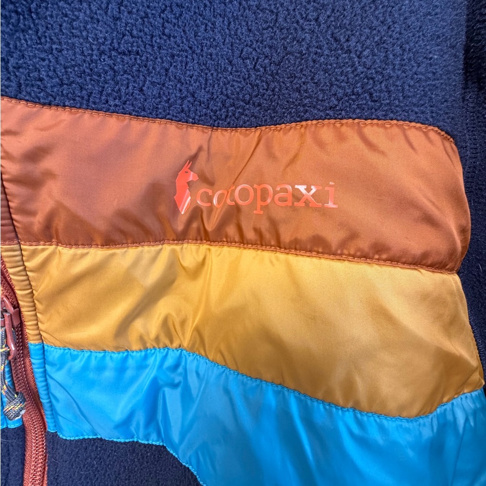 cotopaxi Navy Fleece Jacket with Orange, Yellow & Blue Chest Stripes - Picture 3 of 7